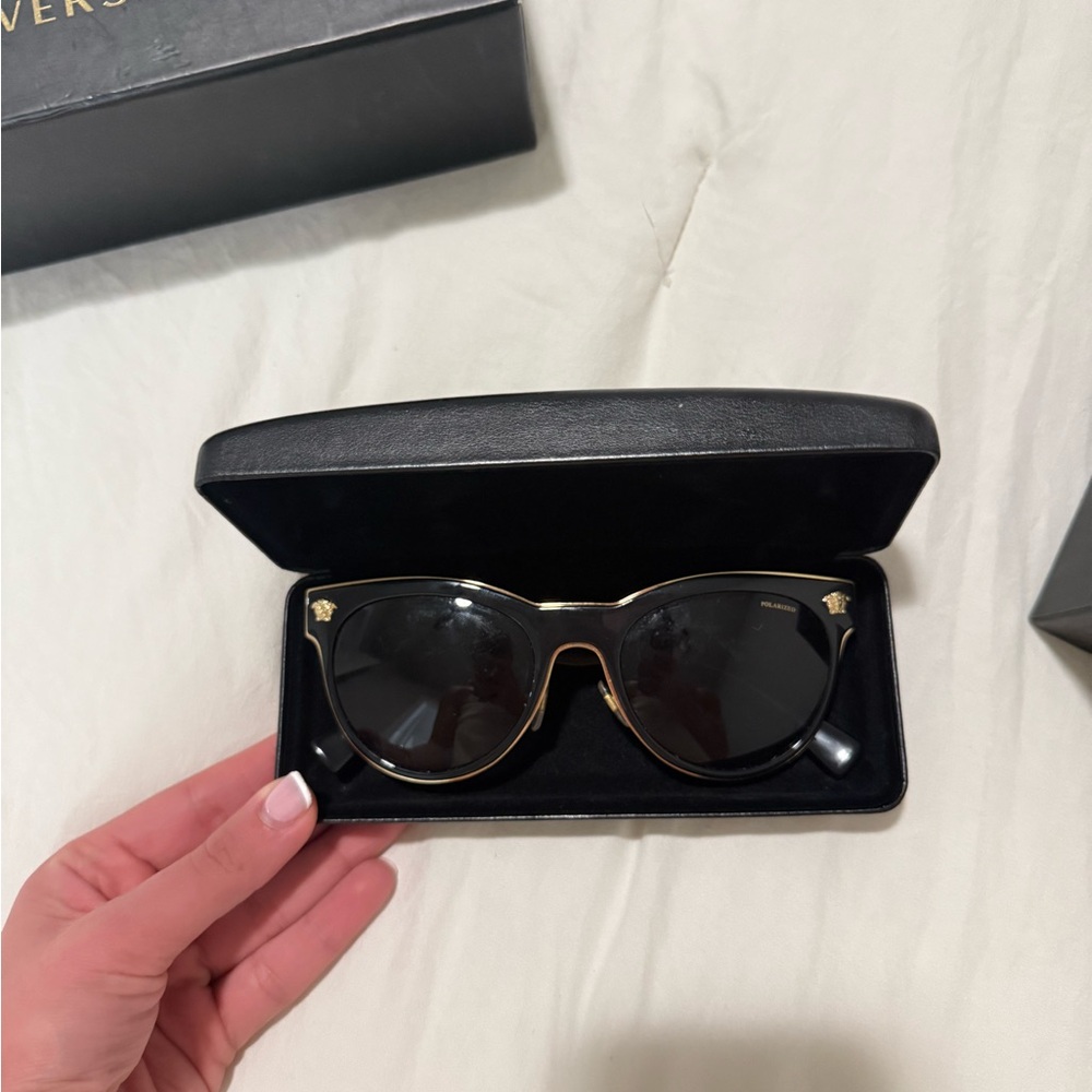 Versace Women's Sunglasses with Black Frame and Gold Detailing